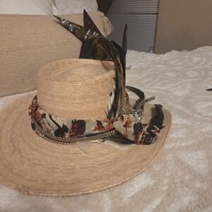 Stylish Tan Hat with Feather and Patterned Band